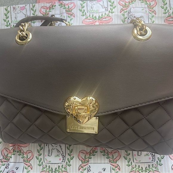 Love Moschino Handbags - LOVE MOSCHINO DK TAUPE HANDBAG. Gold chain strap . Red interior!! New!!